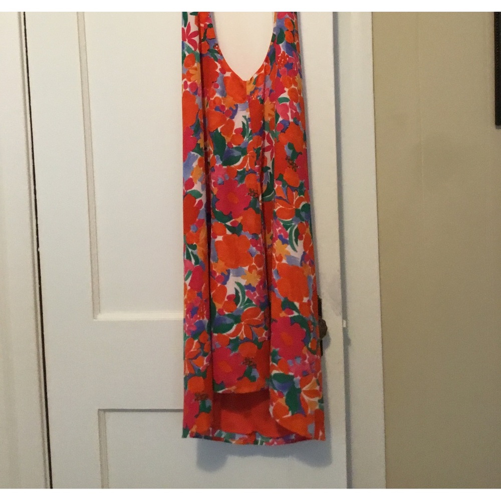 Love this print. Could be worn as a longer top wore a short dress.